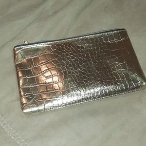 Small Estee Lauder golden snake print makeup bag